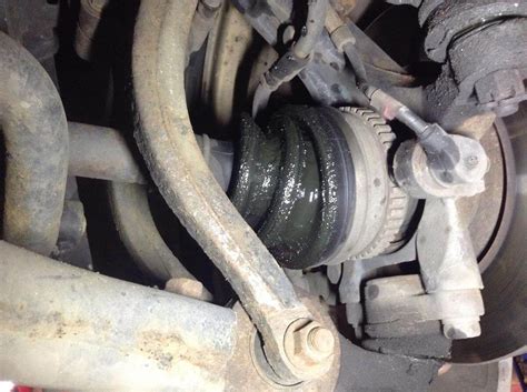 cv axle boot leaking|Symptoms of a Bad or Failing CV Boot